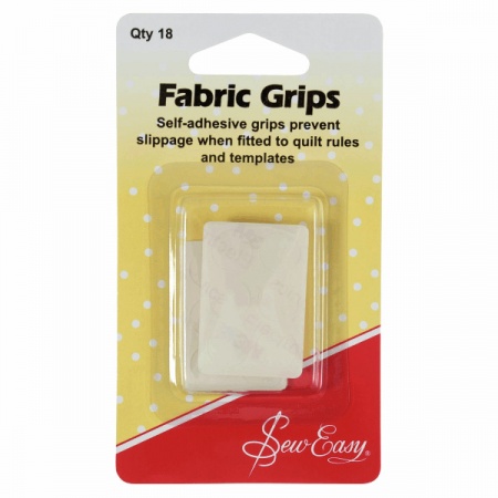 Self adhesive fabric grips for quilting rulers and quilting templates