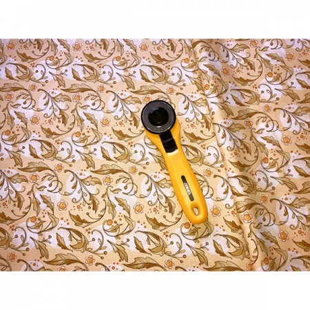 Forest Frolic - swirly leaves butterscotch (per 1/4 metre)